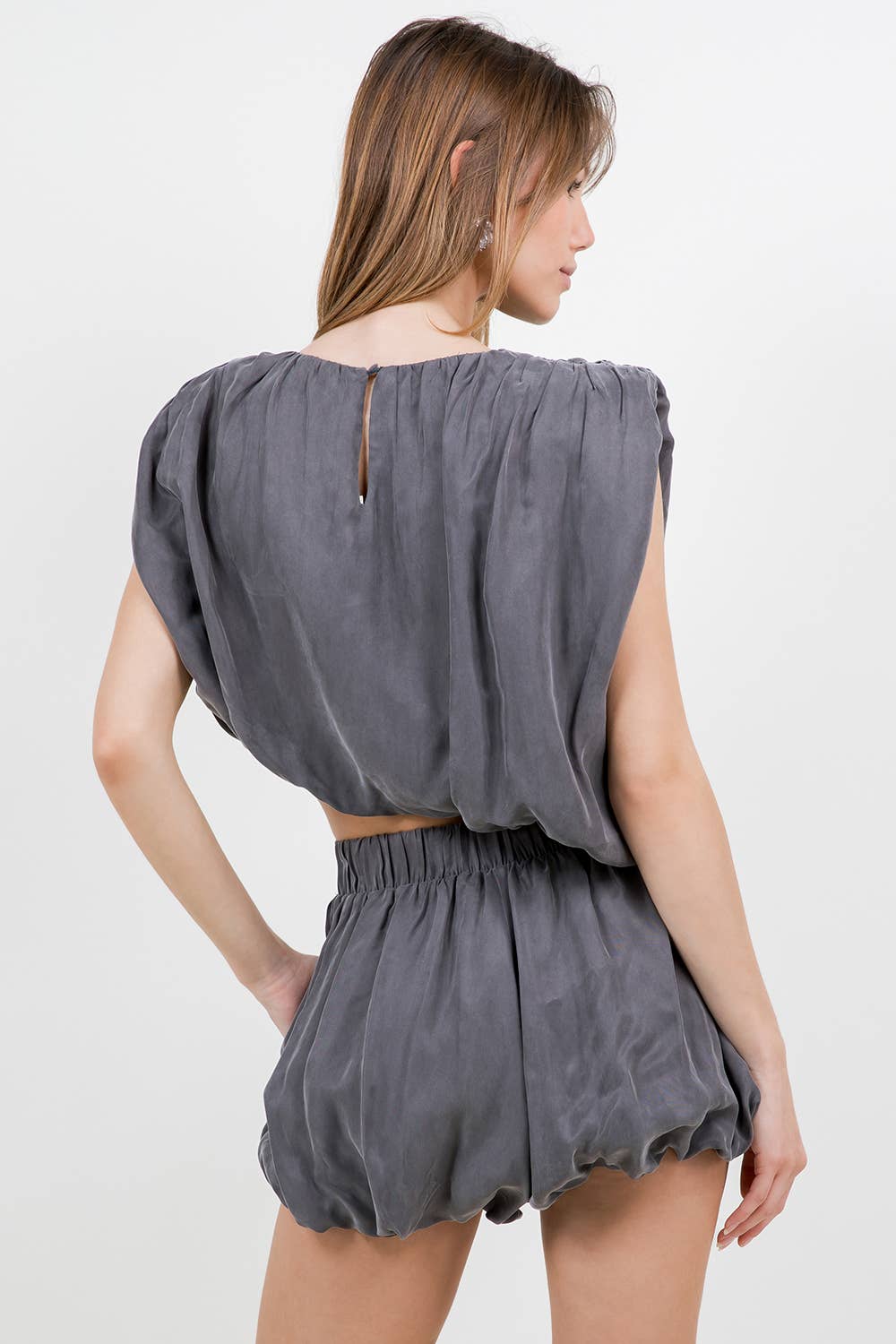 ASYMMETRICAL HEMMED WITH SHOULDER PAD WOVEN TOP - CHARCOAL
