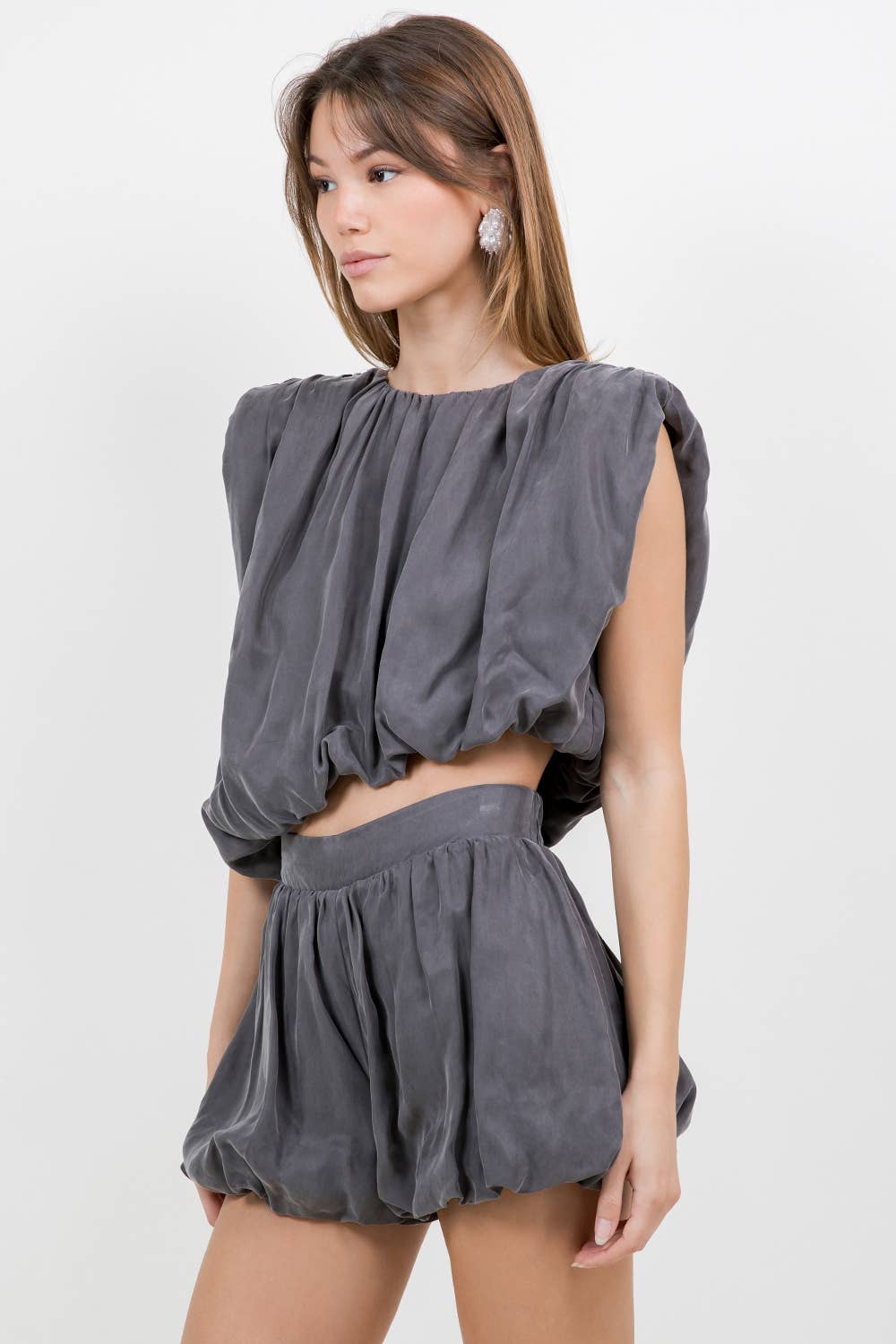 ASYMMETRICAL HEMMED WITH SHOULDER PAD WOVEN TOP - CHARCOAL