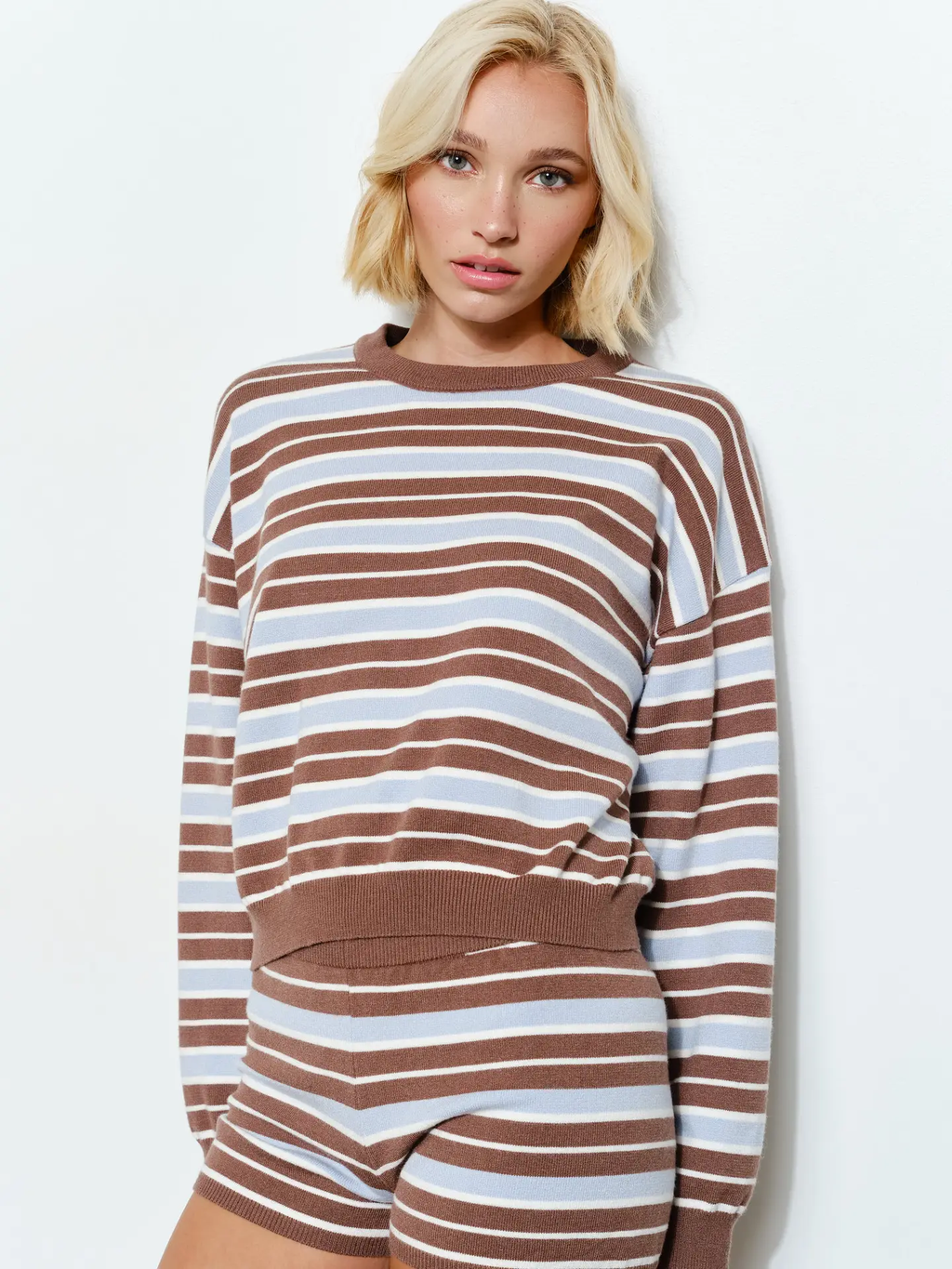 REIGN STRIPED SWEATER